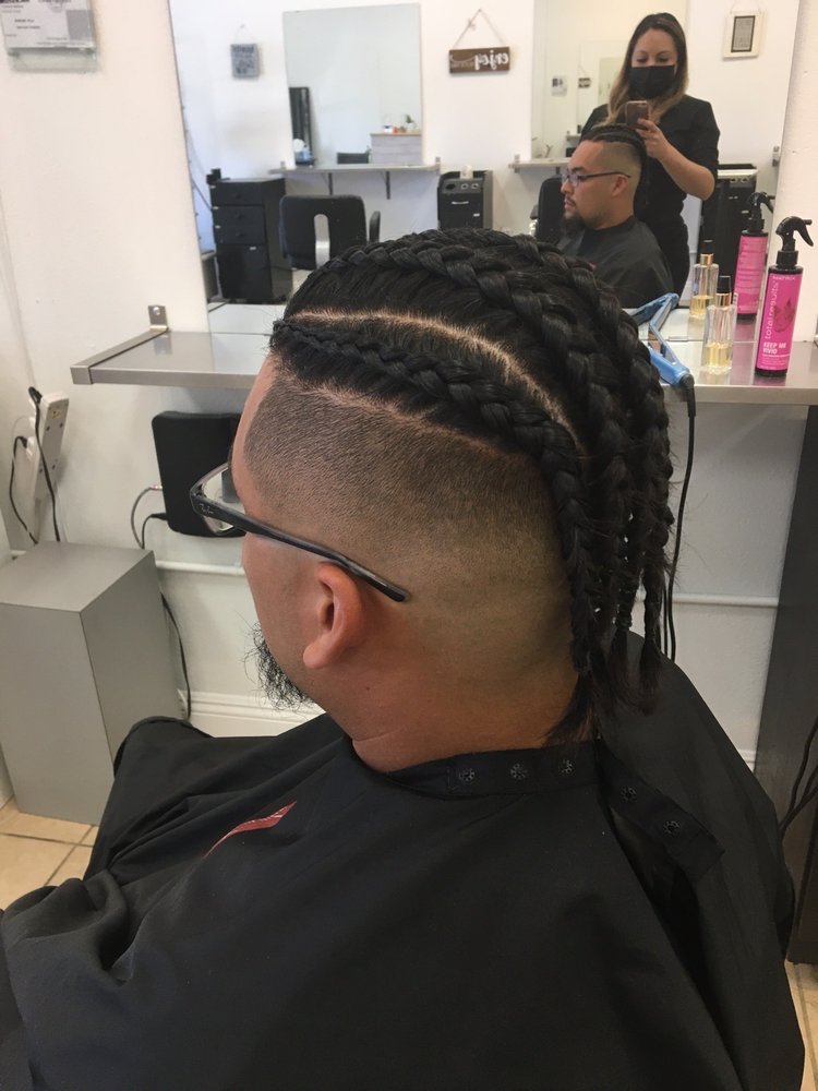 men's haircut shaved on sides with braids
