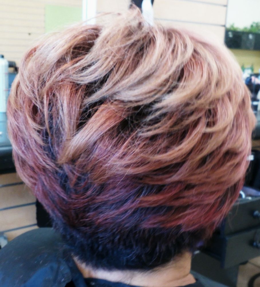 short hair with color layers of blonde, red, purple, black