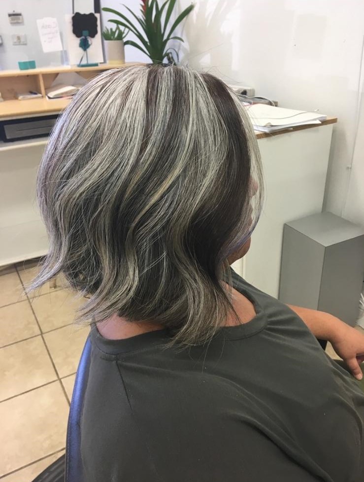 woman with silver hair and black highlights