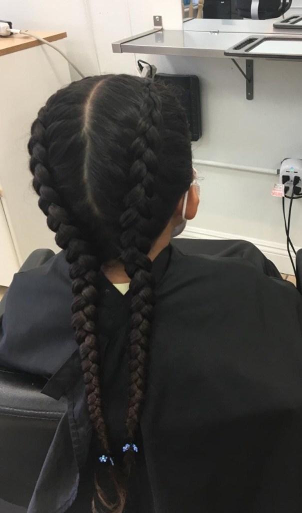 girl with pigtails braid