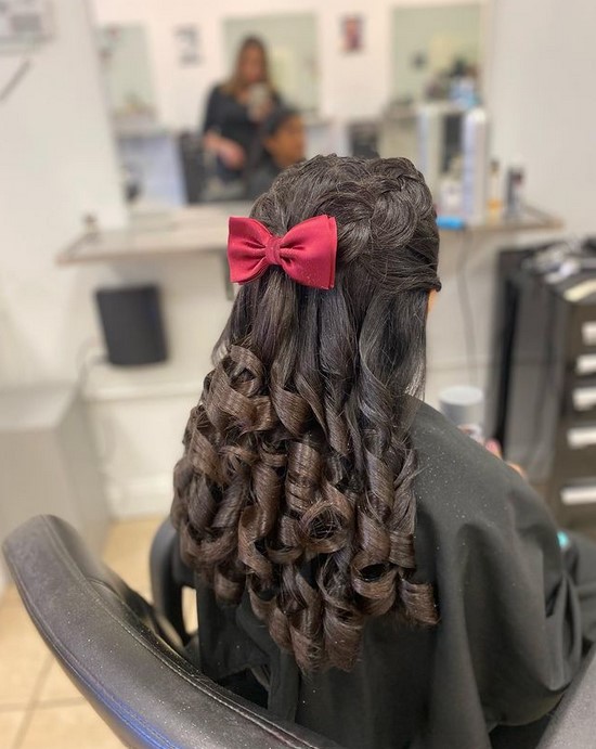 long goldilocks curls hairsytle with red bow